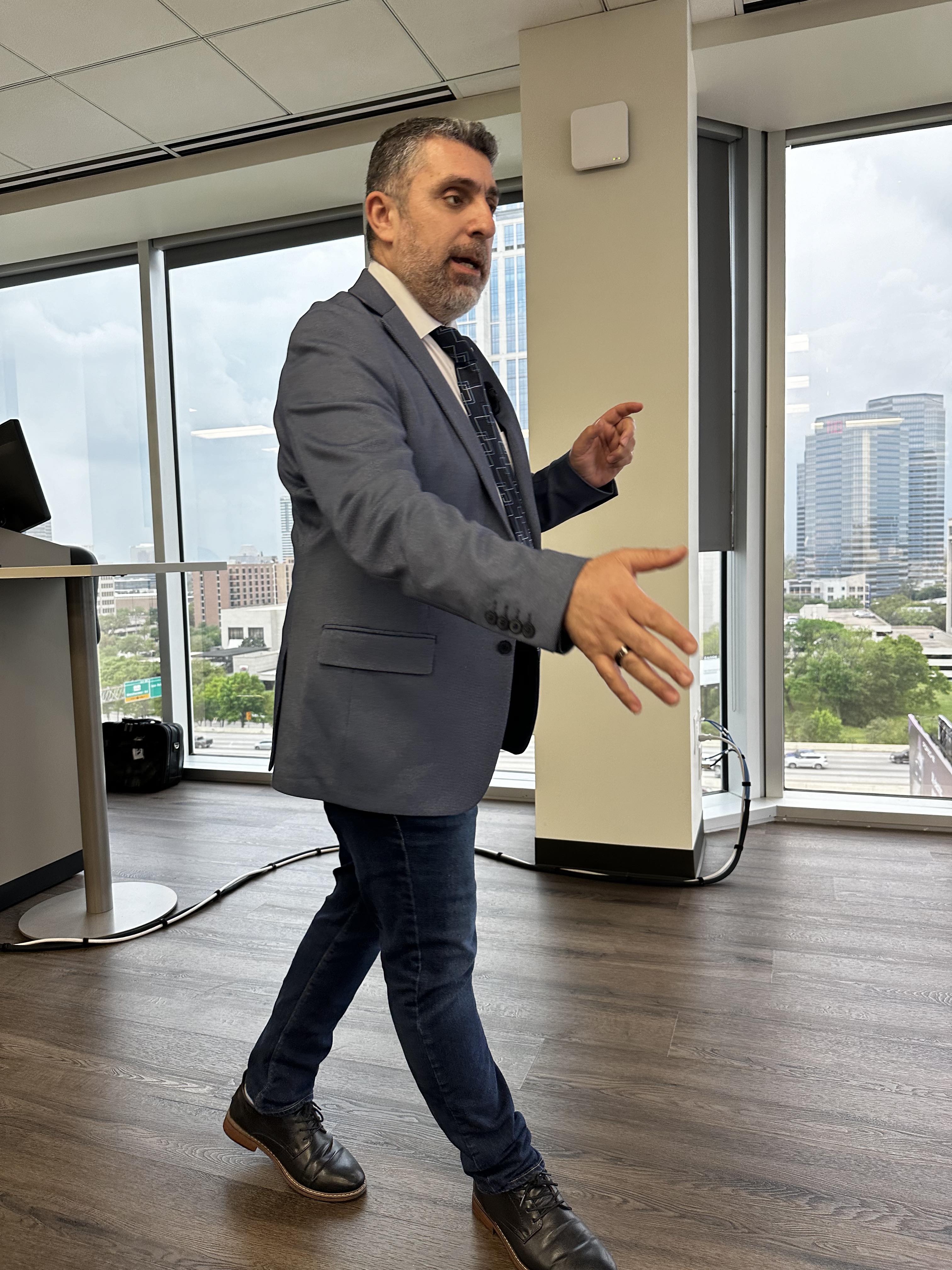 Romeo El Chaer speaking at a live leadership event